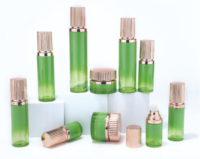 Frasco de botella de vidrio para el cuidado de la piel verde degradado