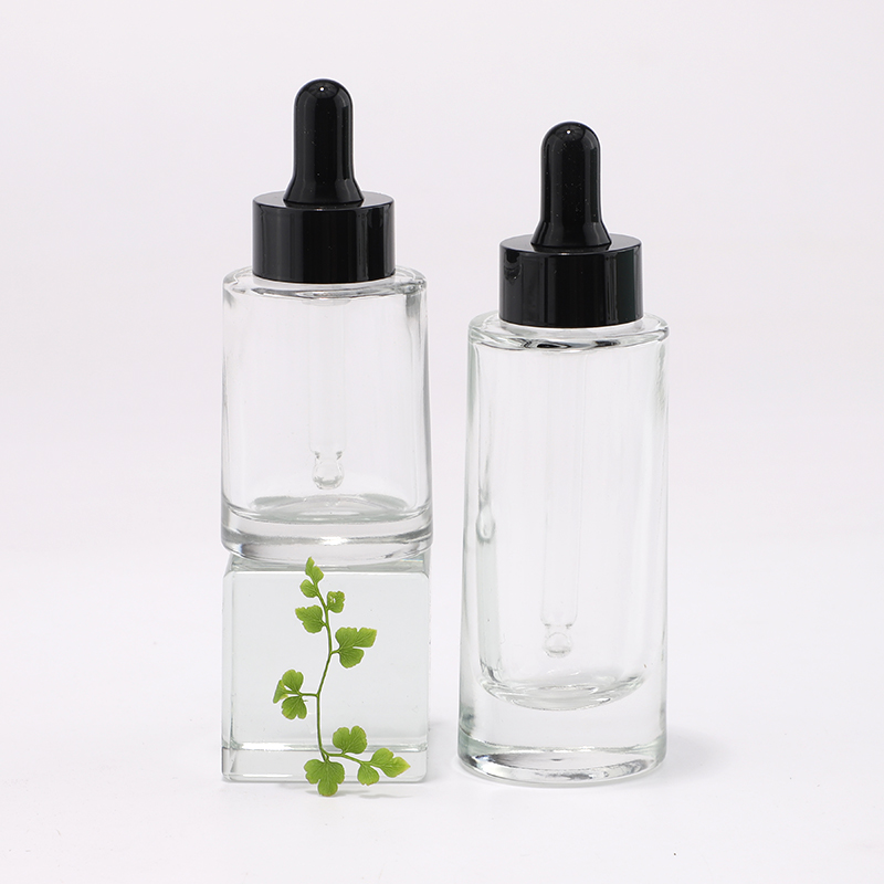Botella de vidrio de color personalizado de 30 ml y 50 ml