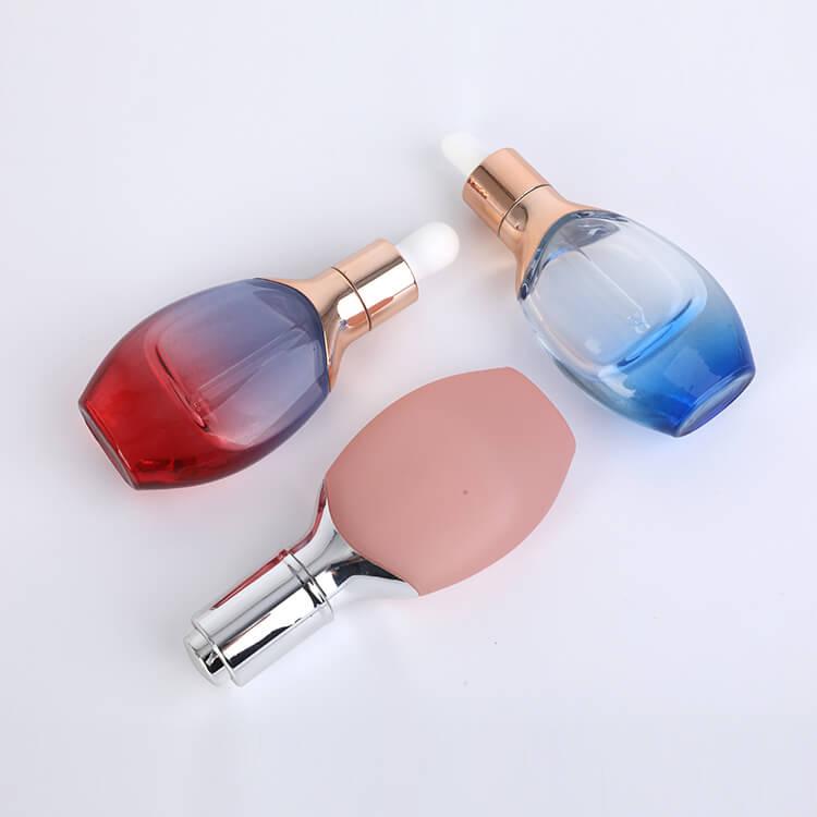 Clear frosted transparent blue glass dropper bottle