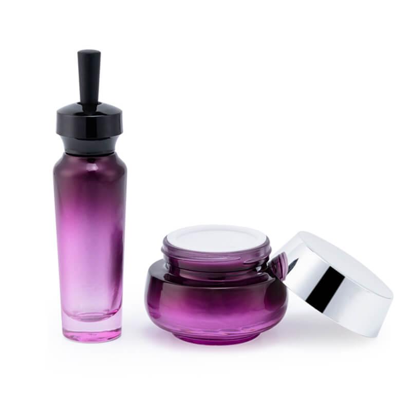 Empty purple glass bottle set