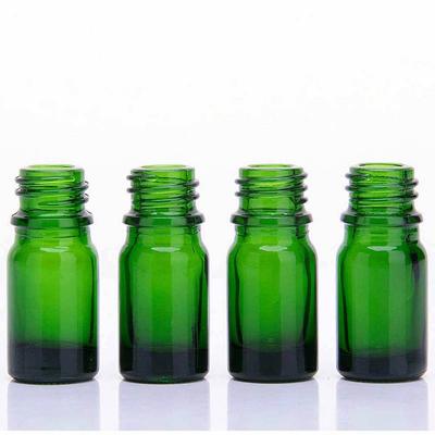Botella de aceite esencial de belleza de vidrio verde
