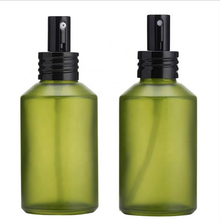 green cosmetic glass bottle
