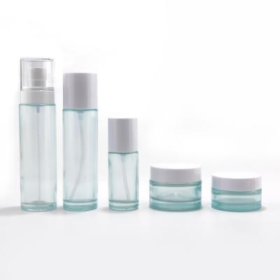 botella de vidrio cosmético de color personalizado y tarro de vidrio para embalaje
