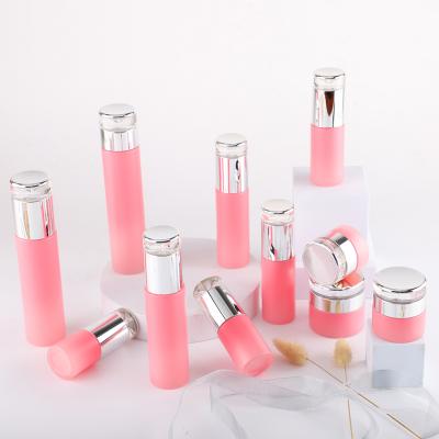 tarro de botella de vidrio cosmético esmerilado rosa
