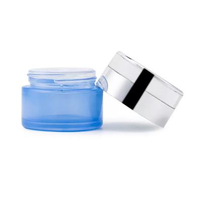 Envase de crema de loción facial vacío tarro de vidrio cosmético azul mate

