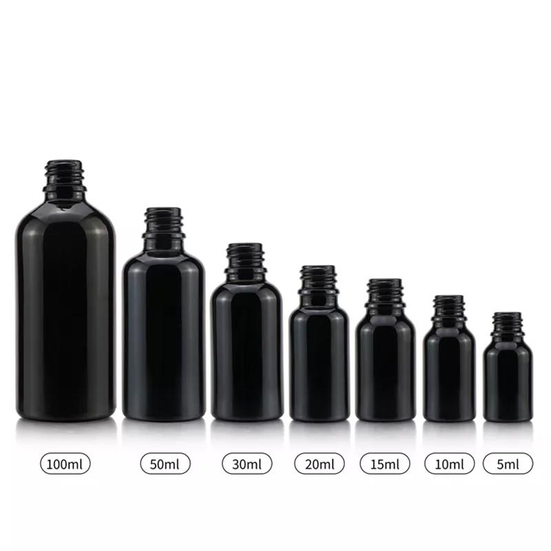 black essential oil glass bottle