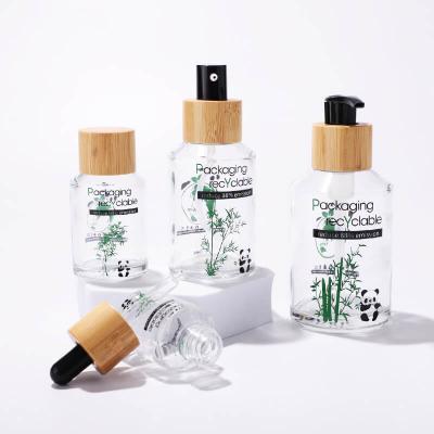 Embalaje cosmético de botella y tarro de vidrio transparente
