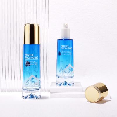 Cilindro de color Gradiente de vidrio azul Envase cosmético Juego de botellas de vidrio para crema Loción Suero Cuidado de la piel Embalaje