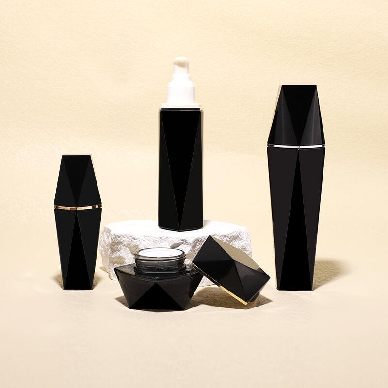 Conjunto de botellas de vidrio cosmético negro vacío para embalaje