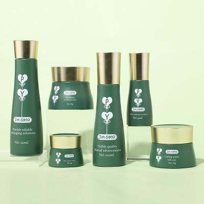 Juego de botellas de vidrio para cosméticos verdes