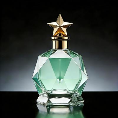 Botella de perfume con tapa de estrella dorada de 50 ml