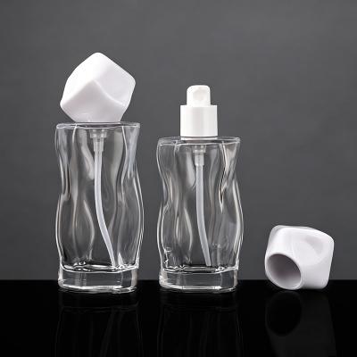 Juego de botellas de vidrio ondulado irregular para cuidado de la piel